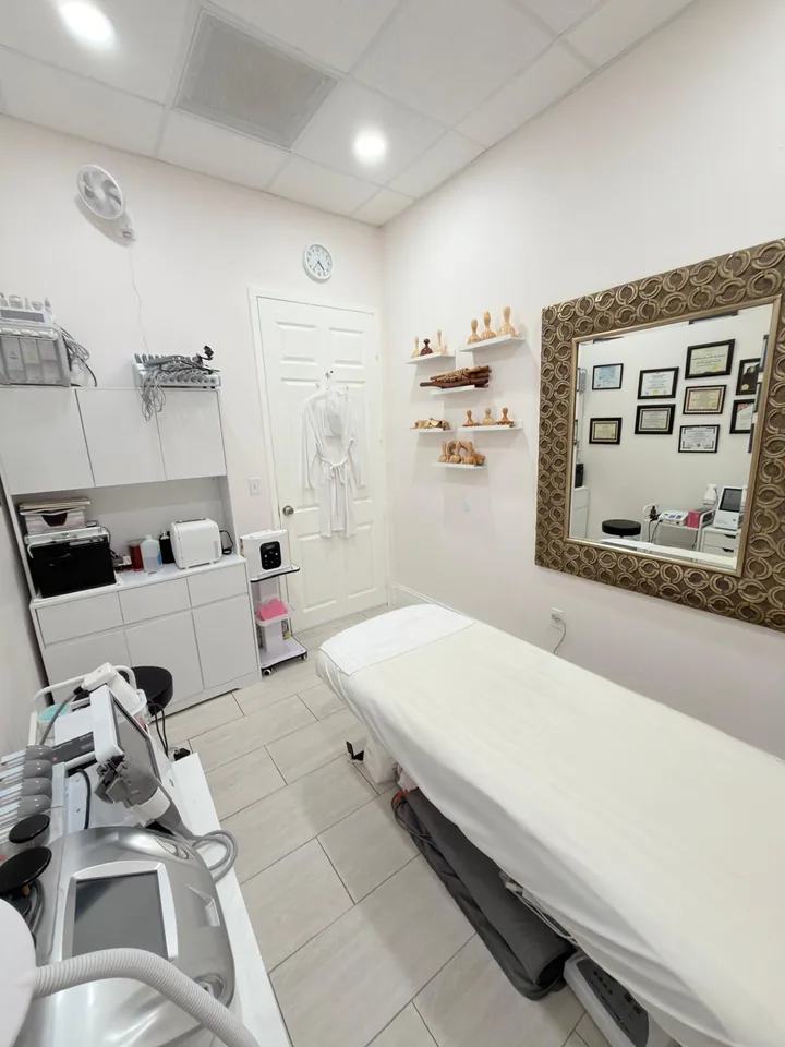 Private facial room with framed art